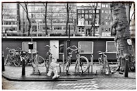 a black and white photo of bicycles on a street