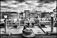 a black and white photo of an outdoor market
